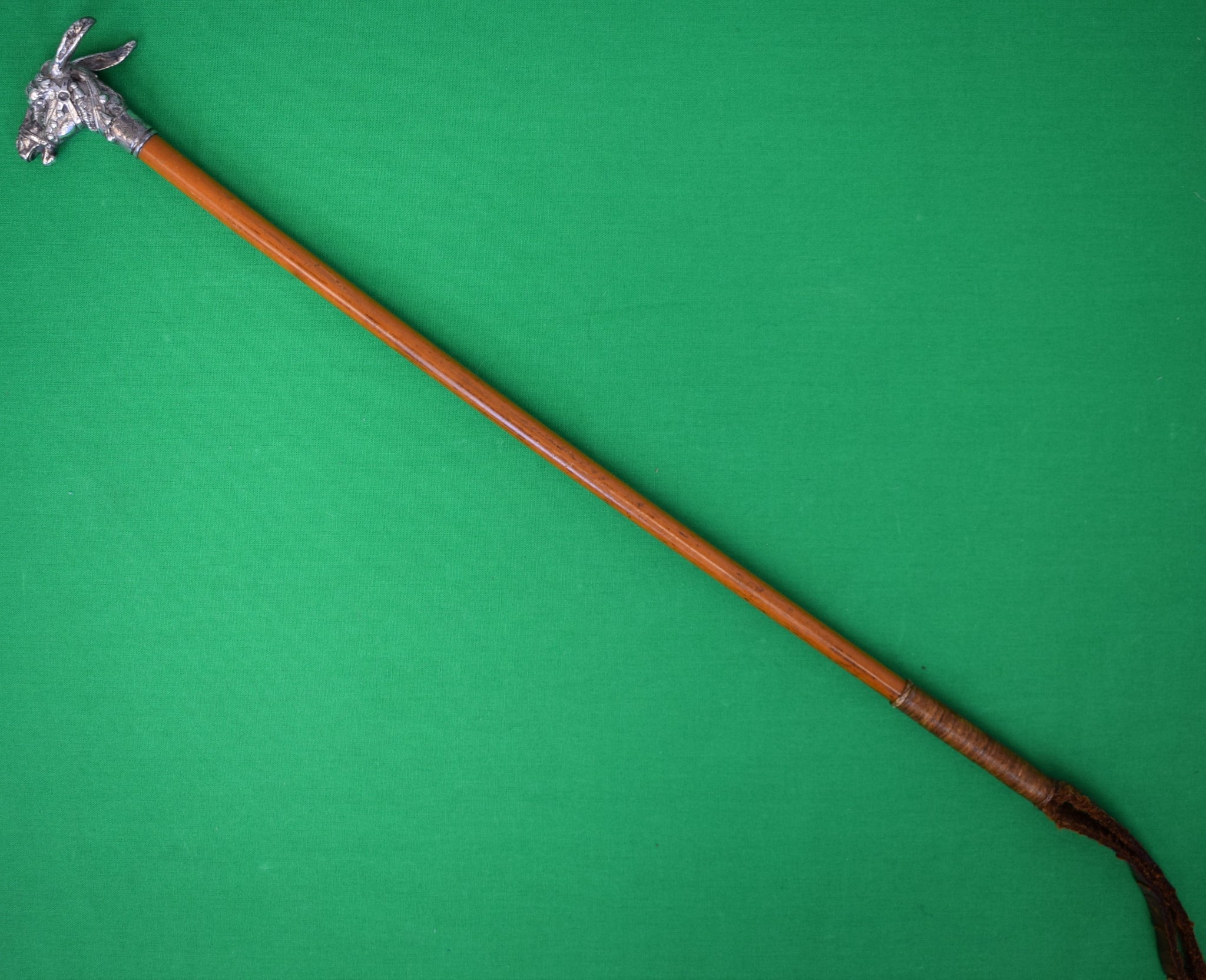 Malacca Riding Crop w/ Sterling Silver Horse Head Handle Provenance: The Susie Hilfiger Collection