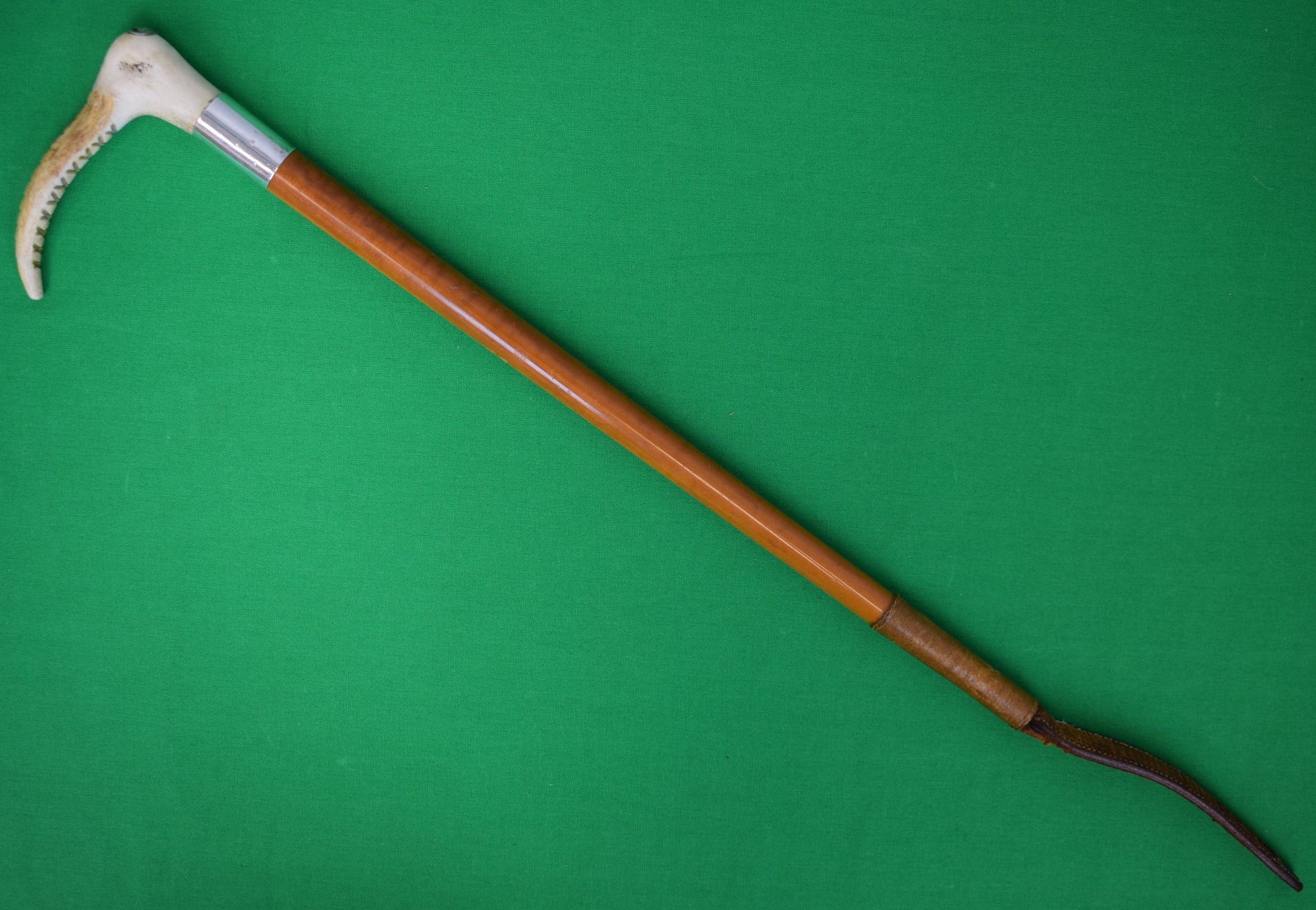 "Swaine Adeney Ltd London Malacca Riding Crop w/ Sterling Ring & Horn Handle" Provenance: The Susie Hilfiger Collection