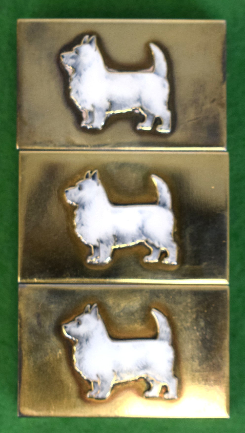 "Set x 3 Sterling Matchbook Holders w/ Enamel Scottish Terriers" Provenance: The Susie Hilfiger Collection