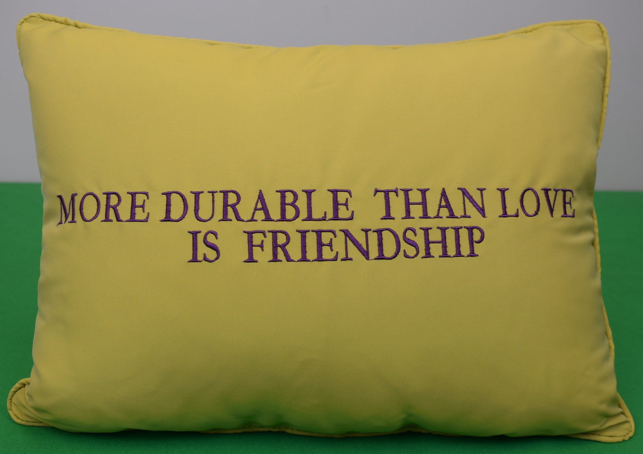 "More Durable Than Love Is Friendship Chartreuse Pillow" Provenance: The Susie Hilfiger Collection