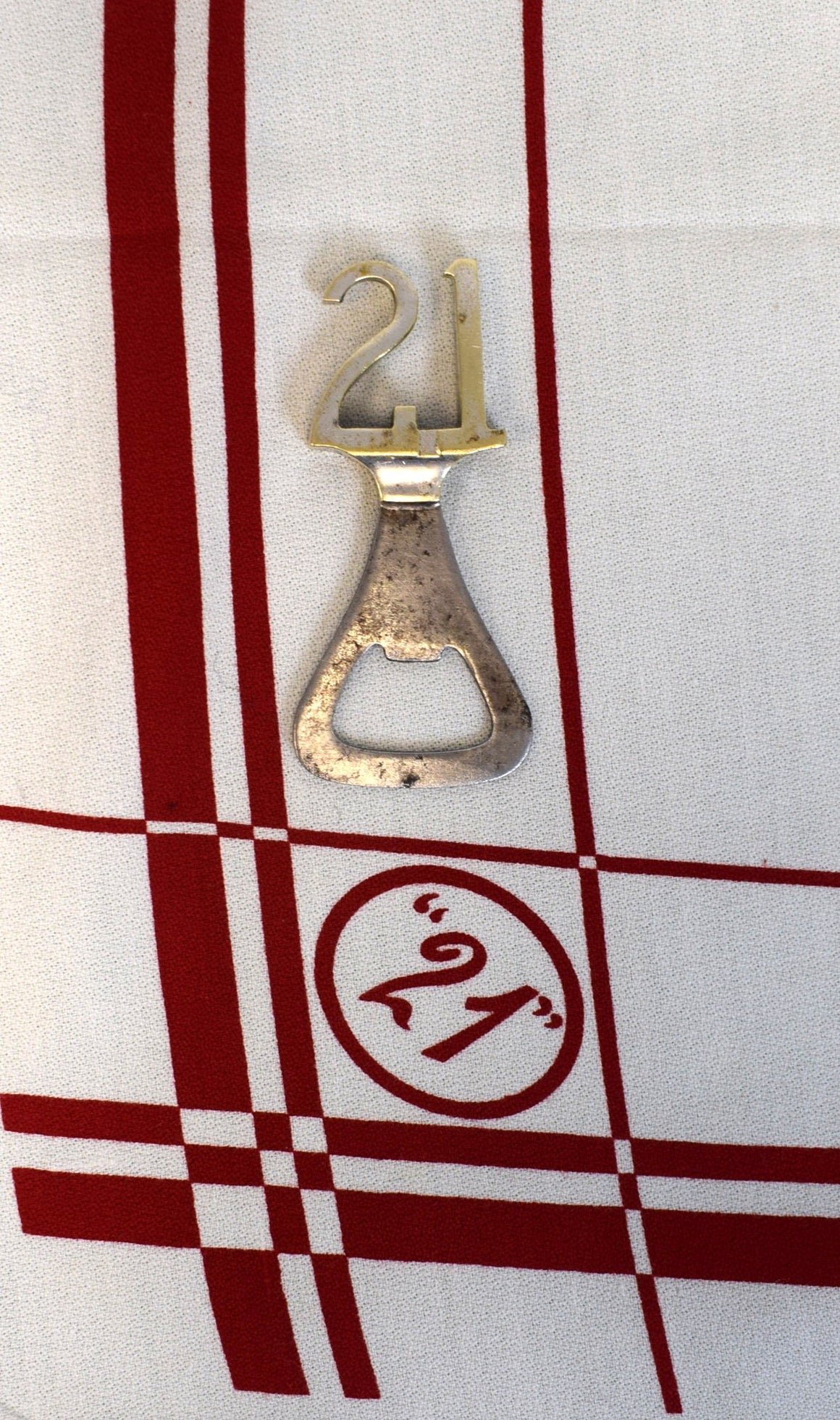 The "21" Club Silver Plate Bottle Opener Made In England