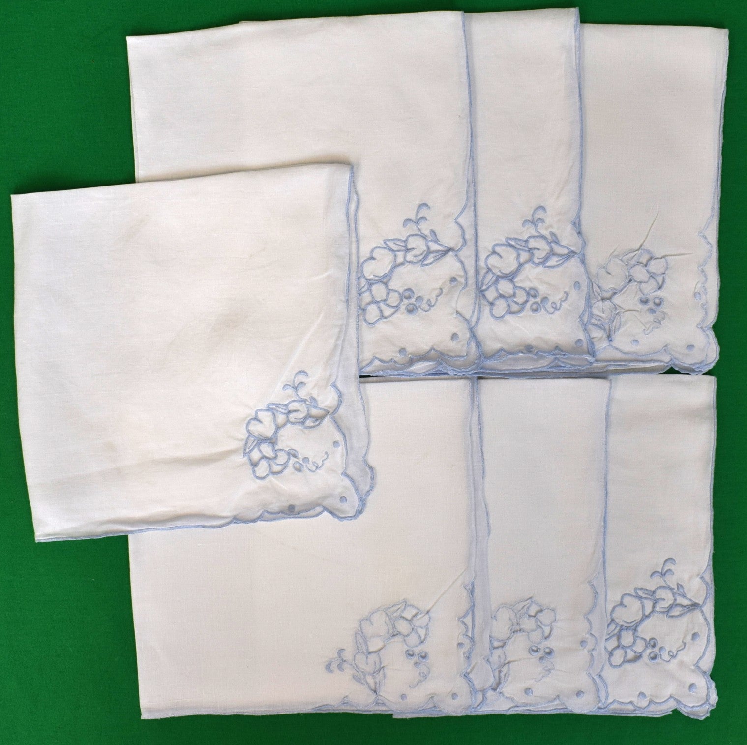 Set x 7 White Linen w/ Blue Embroidery Placemats Provenance: The Susie Hilfiger Collection