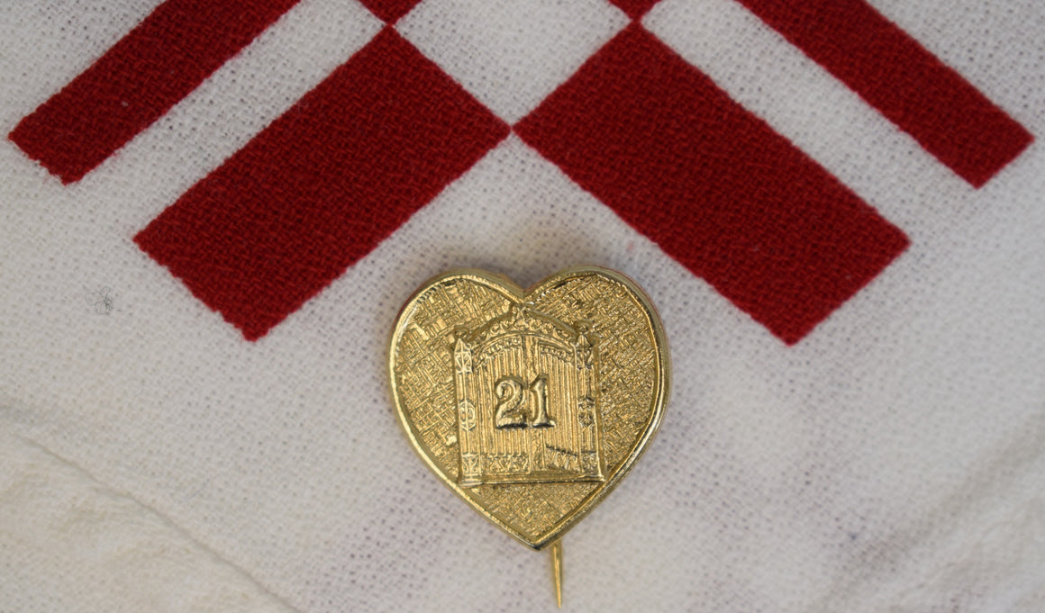 The "21" Club Brass Heart Stick Pin