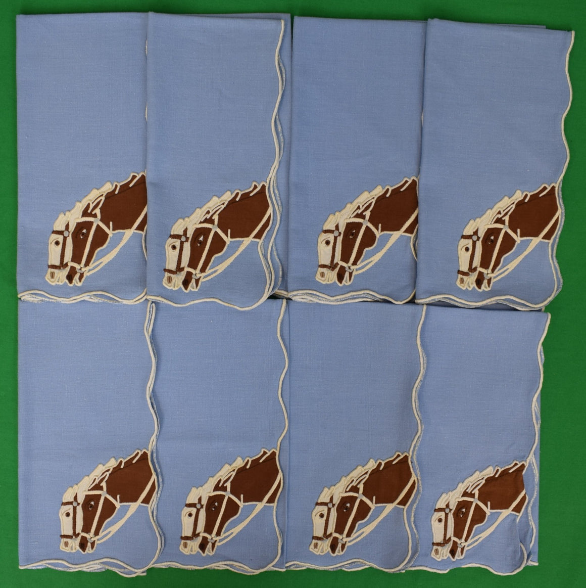 "Set x 8 French Blue w/ White Scallop Edge Cotton Placemats w/ Brown & White Horsehead Corners" Provenance: The Susie Hilfiger Collection (SOLD)