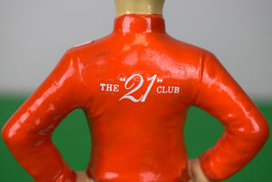 The "21" Club Red Jockey w/ White Diagonal Sash & Brass Plaque