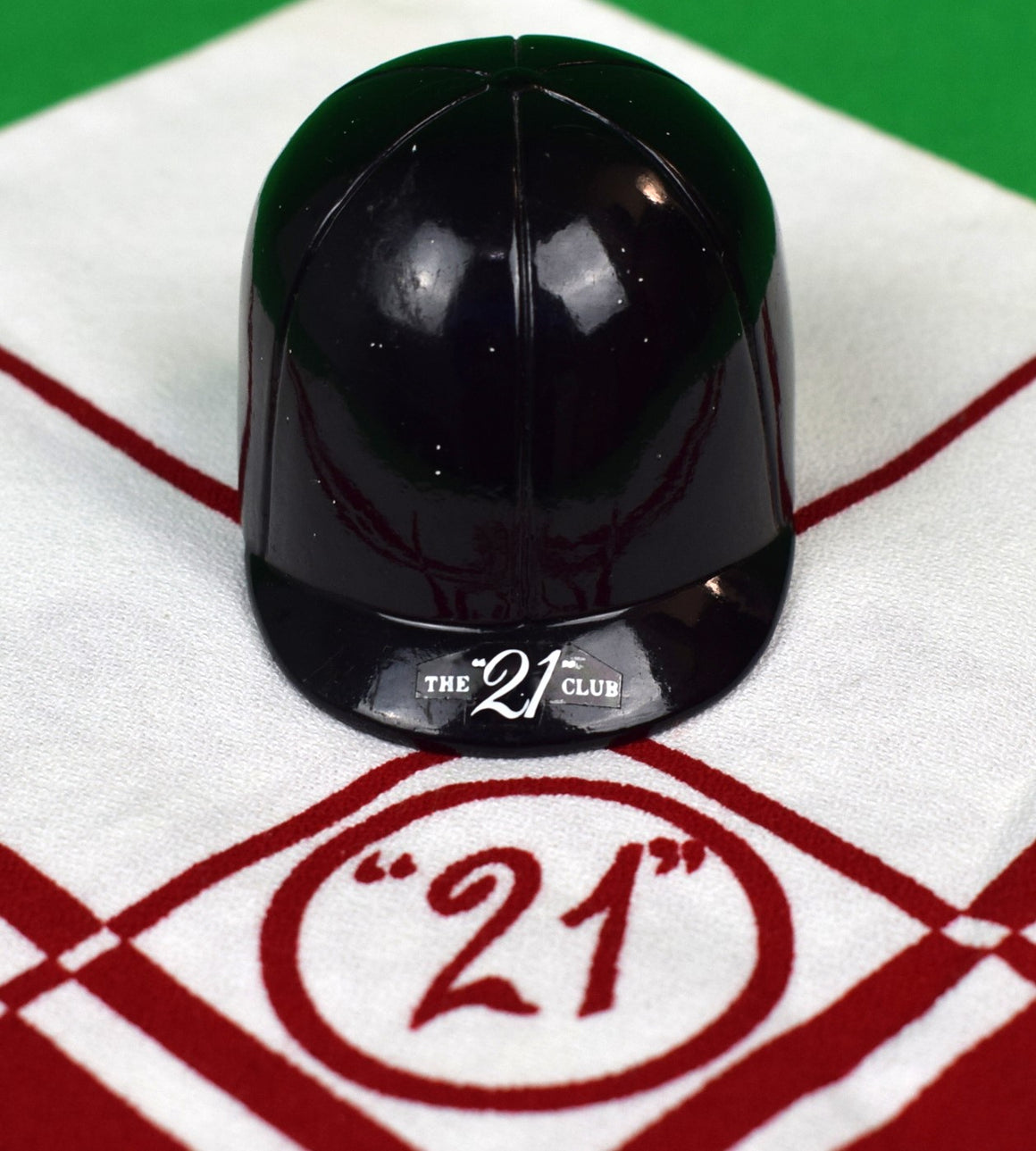 The "21" Club Black Polo Helmet Bottle Opener