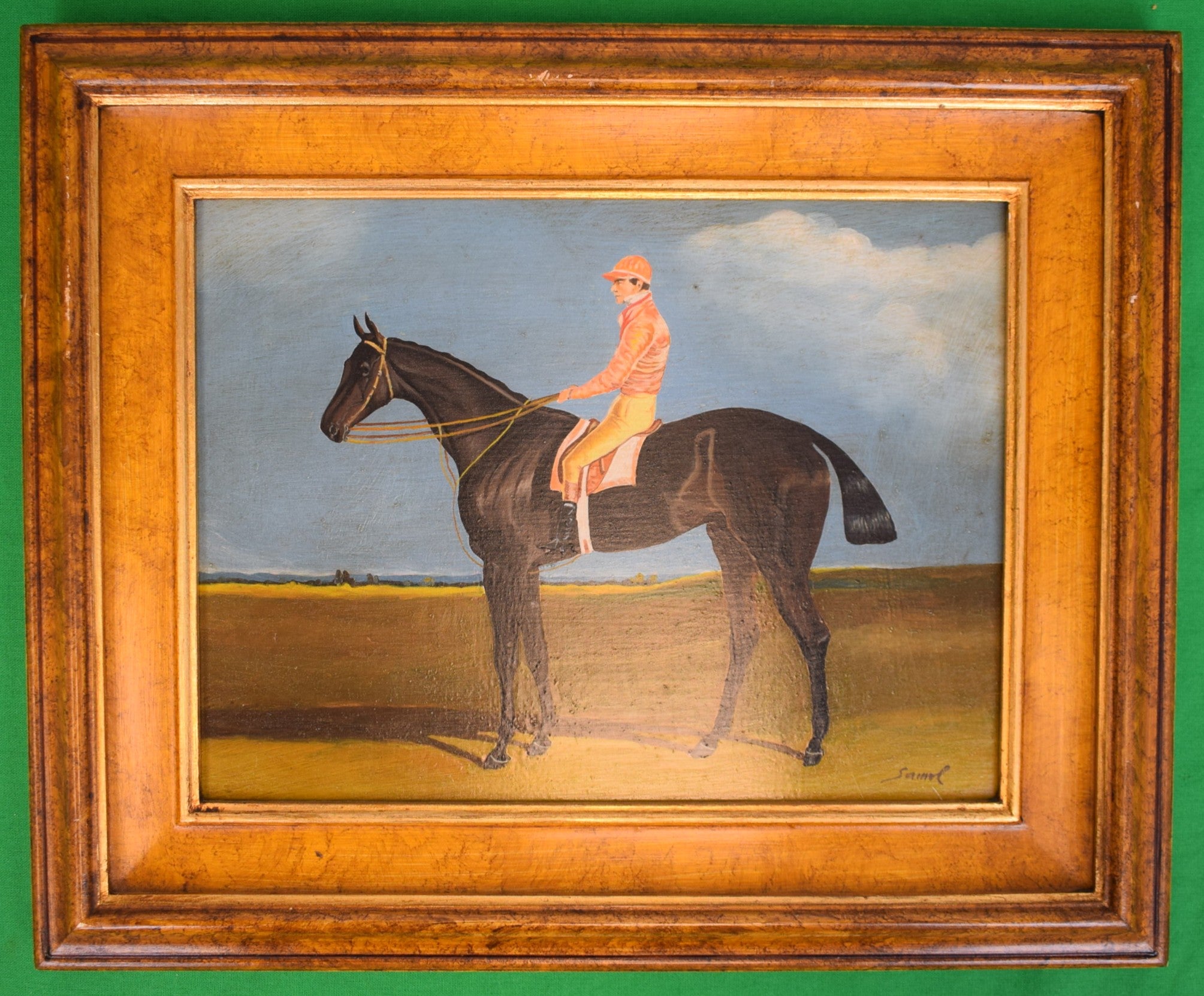 Salmon Pink Silks Jockey Astride Racehorse