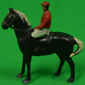 Jockey on Black Racehorse